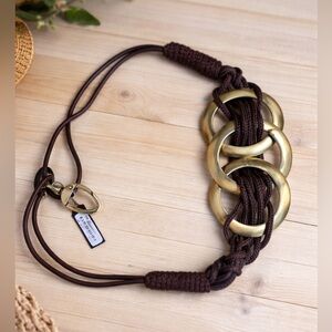 Bebe Brown Belt with Gold Rings. New with tags. Brass has some marks. M/L